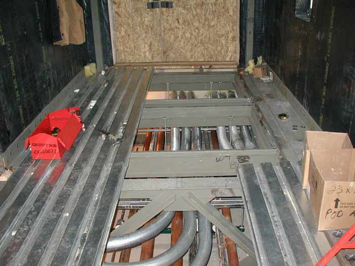 utilities in the subfloor of the level 1 vestibule to the beer can