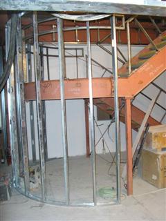constructing the curved stairwell wall