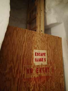 blocked off ice tunnel escape ladder