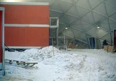 inside of the dome, digging up dirty snow