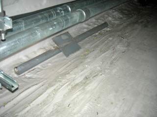one of the pipe supports for the water/sewer lines