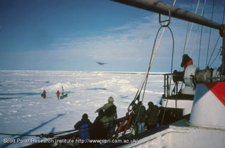 Ran and Charlie approach the ship at the end of their Arctic Crossing