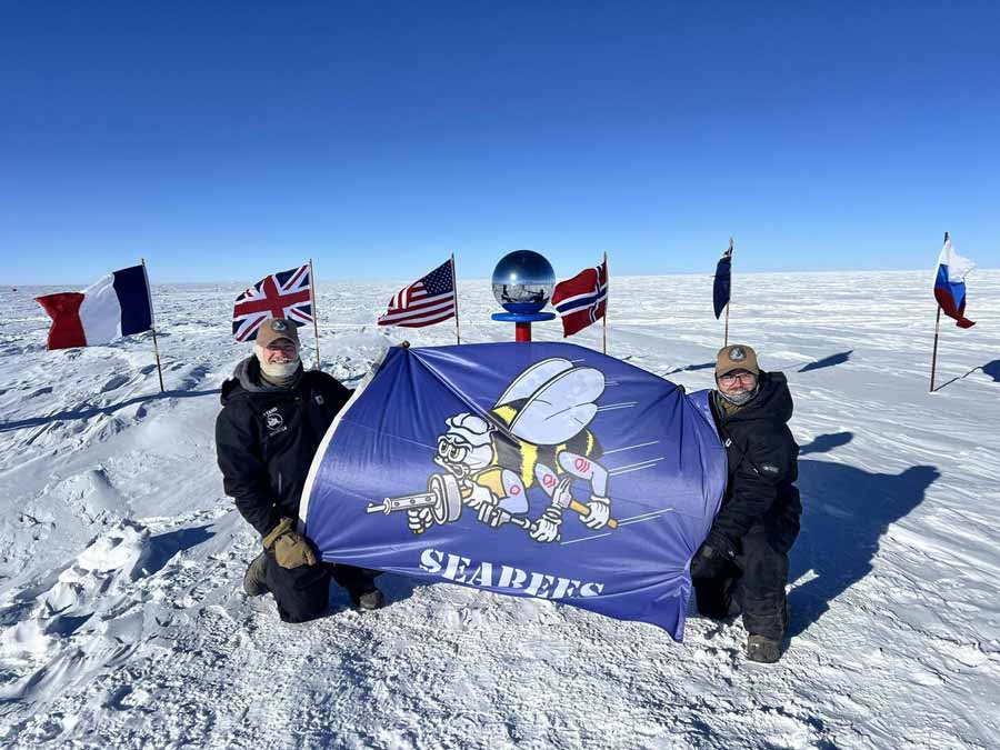 the Seabee flag unfurled at Pole